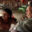 King Harald in conversation with the village chief, Daví Kopenawa. With the help of an interpreter, the two shared experiences and stories about their own cultures. Published 4 May 2013. Handout picture from the Royal Court. For editorial use only, not for sale. Photo: Rainforest Foundation Norway / ISA Brazil.